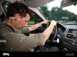 a-man-nodding-off-while-driving-C3NB9W