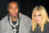 Avril-Lavigne-tyga-kiss-01-030623-6d2b7ab1e66846d5a1265f0416d98eb4