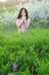 beautiful-girl-flowered-garden-topless-nude-covered-lush-36390625