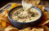 mexican-restaurant-style-white-cheese-queso-dip-2025-06-11-195636-585x390