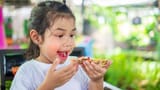 t-thin-crispy-ham-and-pineapple-pizza-up-stretching-cheese-ready-junk-food-photo