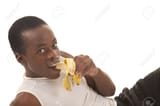 16035334-a-man-after-a-workout-taking-a-bite-out-of-a-banana