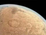 Mars_-_Atmosphere_and_Cassini_Crater_-_Hope_Mission,_Orbit_19_(52252929420) (1)