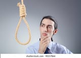 businessman-committing-suicide-through-hanging-260nw-90157864-1266492017