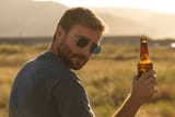 young-man-glasses-beard-drinks-600nw-1822583117