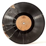 damaged-vinyl-record-isolated-white-background-music-lovers-image-showcases-clean-highlighting-its-broken-edges-359767019