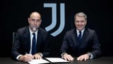 Signing Comolli and Tudor