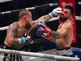 l-punches-mike-perry-r-918546218
