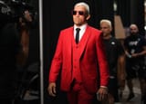 OliveiraRedSuit