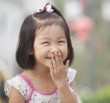 Chinese-kid-laughing-300x281