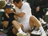 Michael Llodra collides with ball girl