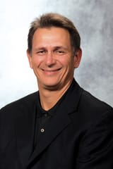 Ken Hollan smirk