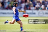 melbourne-australia-caleb-daniel-of-the-kangaroos-kicks-the-ball-during-the-2025-afl-match