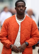 joshua-pearce-f1-2025-orange-bomber-jacket-man[1]
