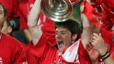 xabi-alonso-lifting-the-uefa-champions-league-trophy