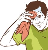sweating man with towel