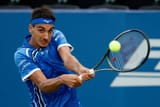 winston-salem-north-carolina-lorenzo-sonego-of-italy-returns-a-shot-from-maxime-cressy-of