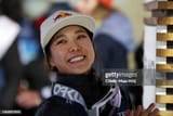 sara-takanashi-of-japan-smiles-after-completing-a-jump-in-the-ski-jumping-womens-individual