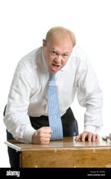 angry-executive-banging-the-desk-with-his-fist-AF5FJ6