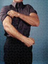 1960s-man-torso-rolling-up-sleeves-vintage-images