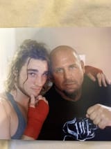 photo-from-2011-of-strickland-and-his-father-v0-b6oq7mp564ud1