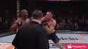 Usman pokes Colby in eye with a punch to the jaw_thumb.jpg