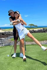 alex-albon-girlfriend-lily-muni-he-golf-032025-b480cf82a3d544fca7ce677e449c9275