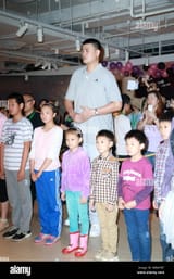 retired-chinese-basketball-superstar-yao-ming-center-poses-with-children-during-the-monet-exhibition-special-care-day-event-in-shanghai-china-1-ju-W8WYB7-2702082411