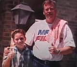 Young Mike McDaniel approached his future step-dad to help him find his lost hat-1674141666429