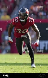 tampa-bay-buccaneers-safety-josh-hayes-32-covers-a-kick-during-an-nfl-football-game-against-the-new-orleans-saints-sunday-dec-31-2023-in-tampa-fla-ap-photopeter-joneleit-2WA9EM8