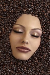 girl-s-face-immersed-coffee-beans-20993212