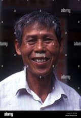 head-and-shoulders-portrait-of-middle-aged-chinese-man-in-china-DETKF8