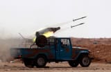 Technical (UB-32-57 S-5 rocket launcher on Toyota FJ45 Longbed Land Cruiser, Ajdabiyah Al Wahat District Libya 21 April 2011)