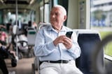 old-european-man-sitting-streetcar-600nw-2253711211
