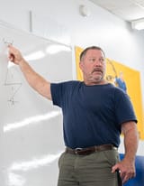 Mark_Rippetoe_teaching_in_2019_(crop)