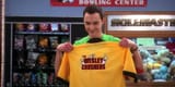 Sheldon-Cooper-holding-up-a-yellow-bowling-shirt-that-reads-The-Wesley-Crushers-in-The-Big-Bang-Theory