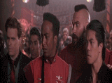 three guys turning their heads at different speeds