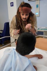 johnny-depp-visits-hospital-27-09262024-55c75856651a4a0b9a5c9ca67d64b643