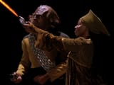 Guinan_beats_Worf_at_phaser_range