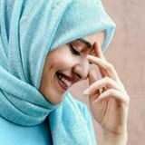 laughing muslim girl