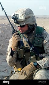 us-marine-uses-a-mbitr-anprc-148-to-radio-headquarters-G3YTY8