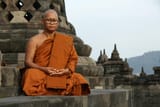 free-photo-of-buddhist-monk-sitting-and-meditating-1518453653