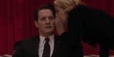 dale-cooper-kyle-maclachlan-looking-unsettled-in-the-lodge-while-laura-palmer-sheryl-lee-whispers-to-him