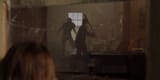 Bo-watching-Merrill-fighting-the-alien-in-Signs-(2002)[1]