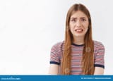 girl-feeling-scared-consequences-look-embarrassed-nervous-cringe-face-clench-teeth-frowning-bothered-standing-concerned-162741652-46548915