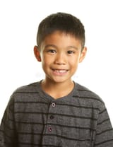smiling-happy-filipino-boy-white-background-58639363
