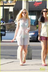 elle-fanning-shows-bright-bikini-in-sheer-dress-10