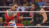 roman-reigns-punch-the-miz