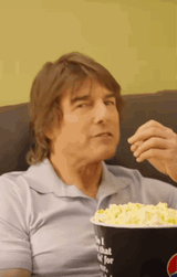 tom enjoying popcorn