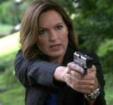solitary svu olivia points gun